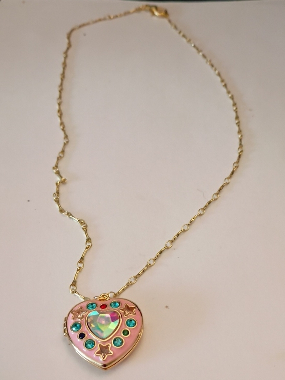 Gold-Tone Heart Locket Necklace with Pink Enamel and Iridescent Gem